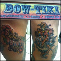 Photo taken at Bow-Tiki Tattoo by Andrew G. on 6/6/2012
