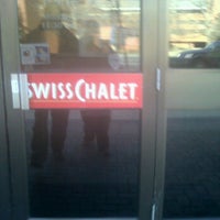 Photo taken at Swiss Chalet by Karla T. on 1/10/2012