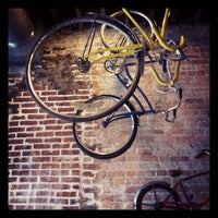 Photo taken at The Hub Coffee &amp;amp; Bicycles by Tim S. on 11/4/2011