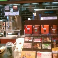 Photo taken at Starbucks by Telma O. on 8/19/2011