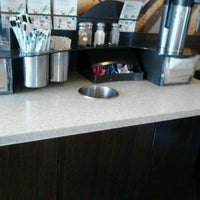 Photo taken at Starbucks by Lindsey O. on 3/20/2012