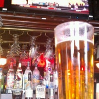 Photo taken at Knuckles Sports Bar by Brian K. on 3/19/2012