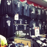 Photo taken at Modell&amp;#39;s Sporting Goods by Mike M. on 7/21/2012