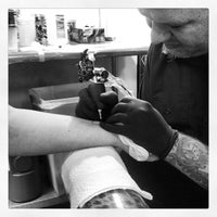 Photo taken at Lucky 7 Tattoo &amp;amp; Piercing by Shayla H. on 8/14/2012