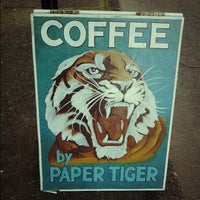 Photo taken at Paper Tiger Coffee Roasters by Justen M. on 3/6/2012