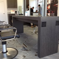 Photo taken at Axiom Cutler Salon by Jesse H. on 2/17/2012