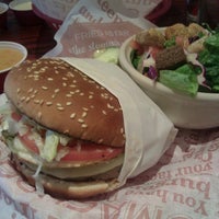 Photo taken at Red Robin Gourmet Burgers and Brews by Meagan W. on 6/10/2012