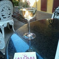 Foto diambil di Las Olas Wine Cafe oleh Erika T. pada 1/15/2012
