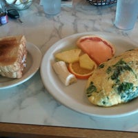 Photo taken at The Skillet House &amp; Pancake Restaurant by Jim N. on 3/16/2012