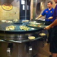 Photo taken at bd&amp;#39;s Mongolian Grill by Wen K. on 6/23/2011
