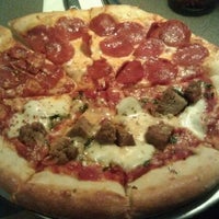 Photo taken at Dewey&amp;#39;s Pizza by Gilbert S. on 1/12/2012