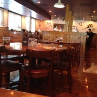 Photo taken at Outback Steakhouse by Mike G. on 7/28/2012