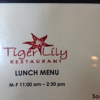 Photo taken at Tiger Lilly Restaurant by Bret U. on 5/14/2012