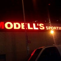 Photo taken at Modell&amp;#39;s Sporting Goods by Lou V. on 12/24/2011
