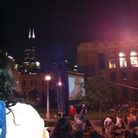 Photo taken at Fulton River District- Movies In The Park by Evan J. on 6/29/2011