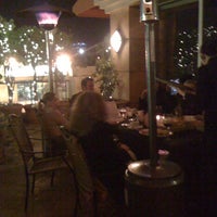 Photo taken at Athenea Bar &amp; Grill by Sarah D. on 2/2/2011