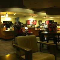 Photo taken at Starbucks by Brett M. on 1/2/2012