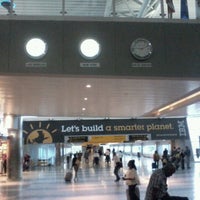 Photo taken at Concourse B by Mauricio T. on 8/1/2012