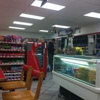Photo taken at OXXO by Marcos V. on 10/4/2011