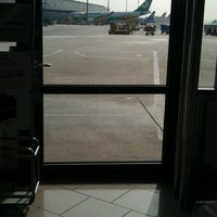 Photo taken at Gate D68 by Alexander A. on 4/13/2012