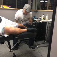 Photo taken at Genuine Electric Tattoo by Charlie B. on 3/7/2012