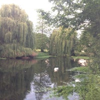 Photo taken at Ravensbury Park by Kelesha S. on 7/28/2012