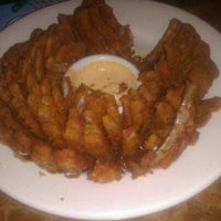 Photo taken at Outback Steakhouse by Chris L. on 8/15/2011