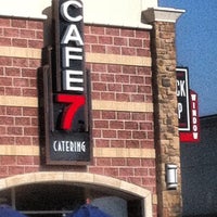 Photo taken at Cafe 7 by Evan N. on 7/23/2012