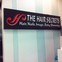 Photo taken at Hair Secrets by Adeline L. on 12/21/2011