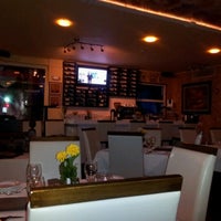 Foto tomada en Ghiottone Restaurant  por Suzette C. el 7/17/2012