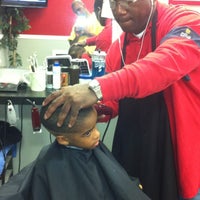 Photo taken at New Looks Barber Shop by Glen G. on 3/10/2012