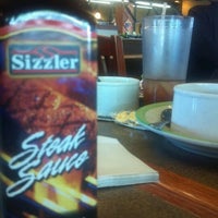 Photo taken at Sizzler by Stefanie R. on 7/17/2012
