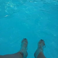Photo taken at Fountain Parc Pool by Kat S. on 6/14/2012