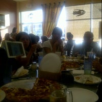 Photo taken at Rizzo&amp;#39;s Pizzeria by Chuck G. on 5/19/2012