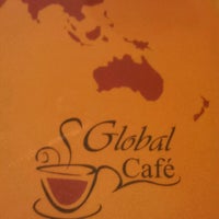 Photo taken at Global Café by Gisele V. on 6/28/2012