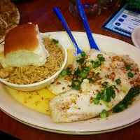 Photo taken at Mambo Seafood by Stephanie G. on 1/23/2012
