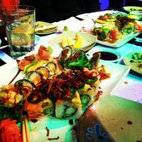 Photo taken at Tokyo Delve&#39;s Sushi Bar by Evan A. on 1/31/2012