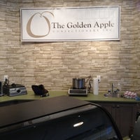 Photo taken at The Golden Apple Confectionery Inc. by Andrew A. on 4/27/2012