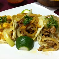 Photo taken at Rancheros Taqueria by Christopher H. on 2/23/2011
