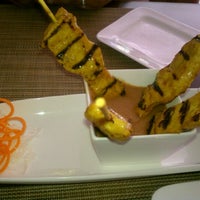 Photo taken at Sweet Basil Thai Cuisine by Jaspreet S. on 8/10/2011