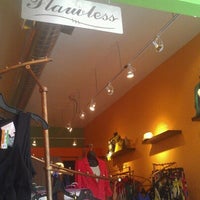 Photo taken at Flawless Fashion Boutique by Kevin E. on 7/27/2012
