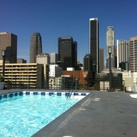 Photo taken at Renaissance Tower Roof Top Pool Deck by Spenser B. on 9/4/2012