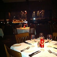 Photo taken at Simms Steakhouse by Marianne B. on 1/1/2011