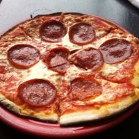 Photo taken at Stone Hearth Pizza by Peter S. on 5/21/2012