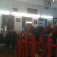 Photo taken at Big Russ Barber Shop by The Mighty G. on 4/27/2012