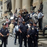 Photo taken at Occupy Wall Street by Zachariah W. on 4/20/2012