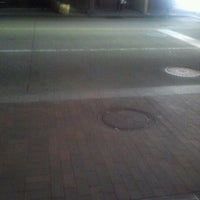 Photo taken at Bus Stop @ 7th St. &amp;amp; Penn Ave. by Thomas S. on 2/23/2012