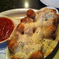 Photo taken at Piesanos Stone Fired Pizza by Jon S. on 7/24/2011