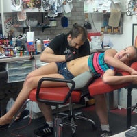 Photo taken at In Your Face Tattooz, L.L.C. by Natalyn N. on 7/31/2012