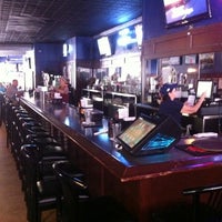 Photo taken at Front Page Sports Bar &amp; Grill by Eric T. on 7/12/2011